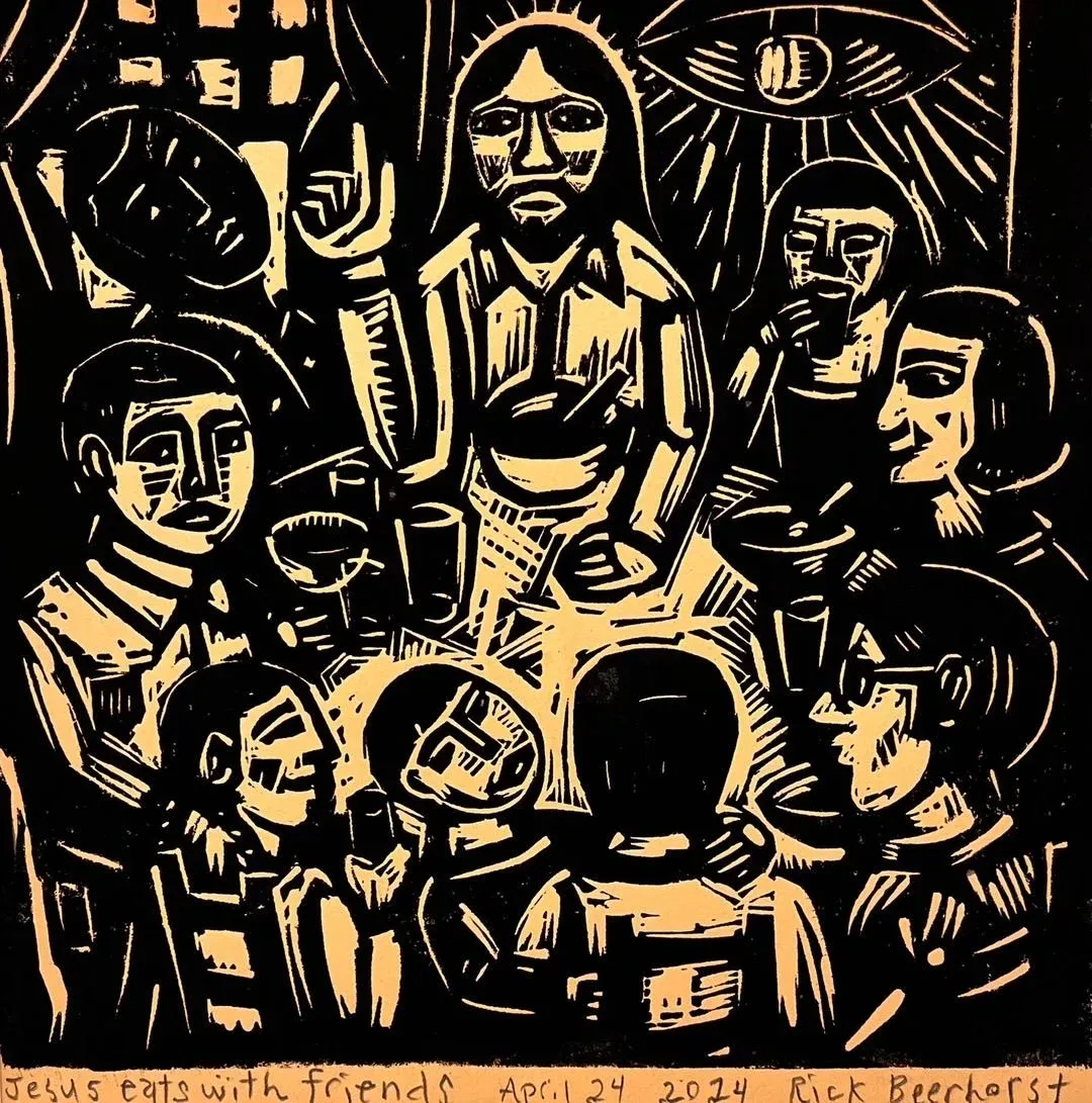 A woodblock print: Jesus at a crowded table with friends, everyone leaning in over cups and bowls, cut in heavy black ink on warm ochre paper.